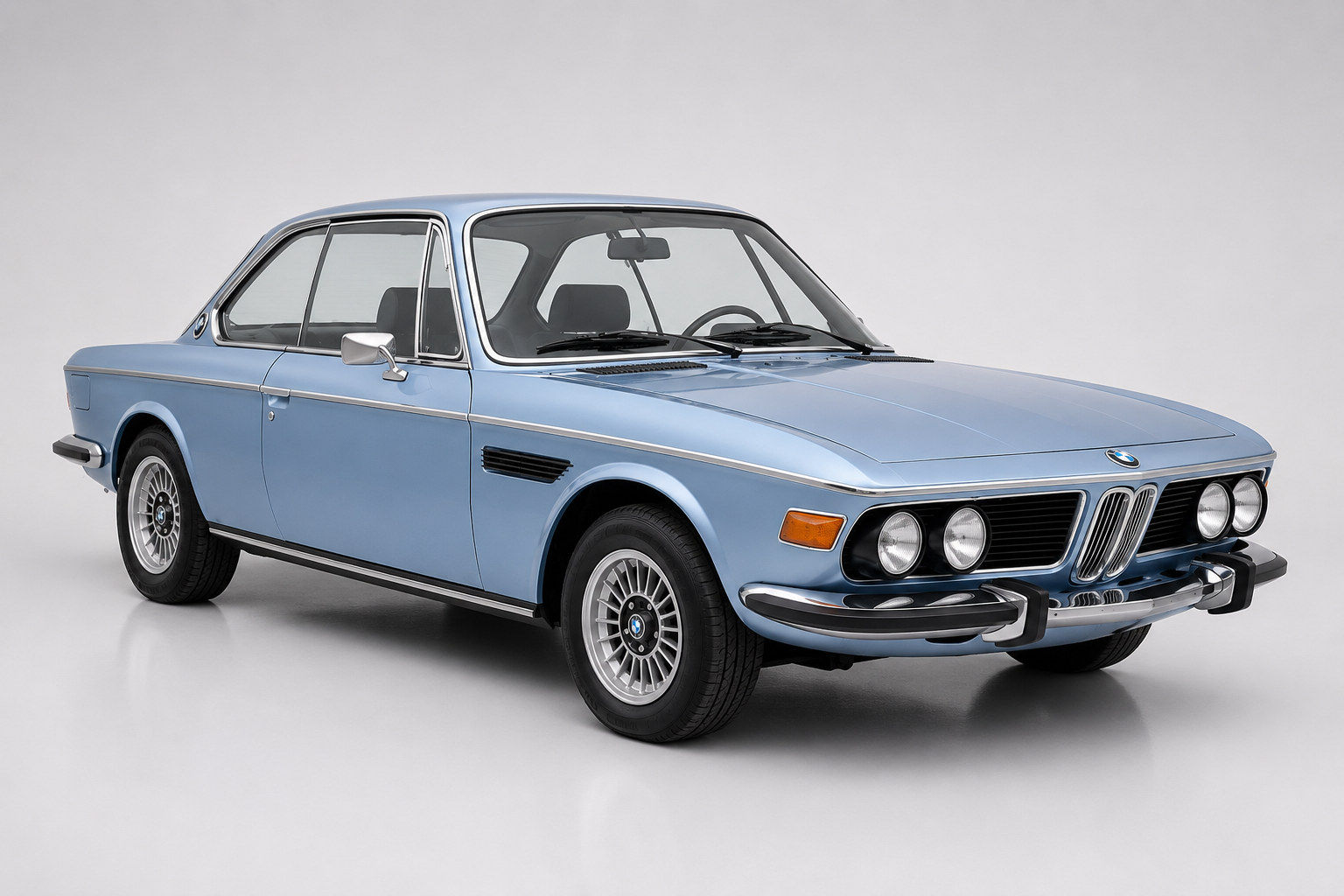 Light blue metallic BMW 3.0 CS E9 coupé, front three-quarter view