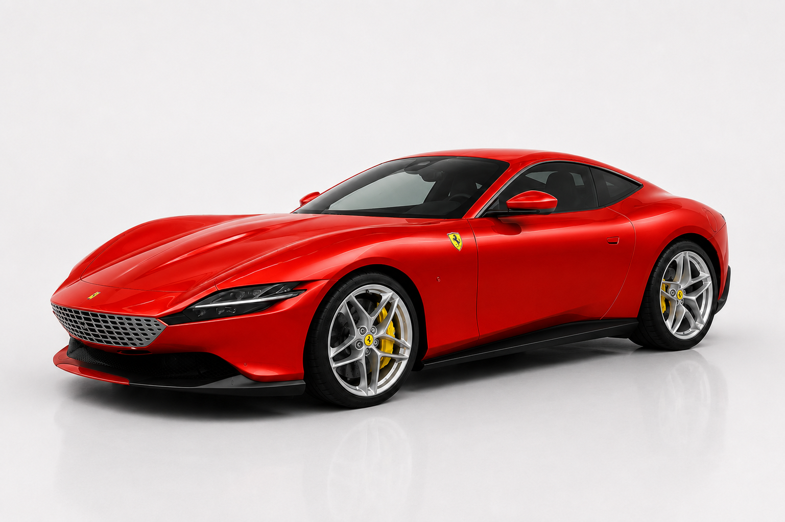 Red Ferrari Roma coupé photographed in a studio, front three-quarter view showing the seamless body-coloured mesh grille, slim LED headlamps, sculpted flanks, yellow brake calipers and silver multi-spoke alloy wheels.