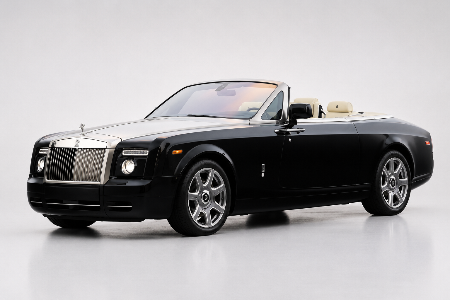 Rolls-Royce Phantom Drophead Coupé, black over cream, front three-quarter view