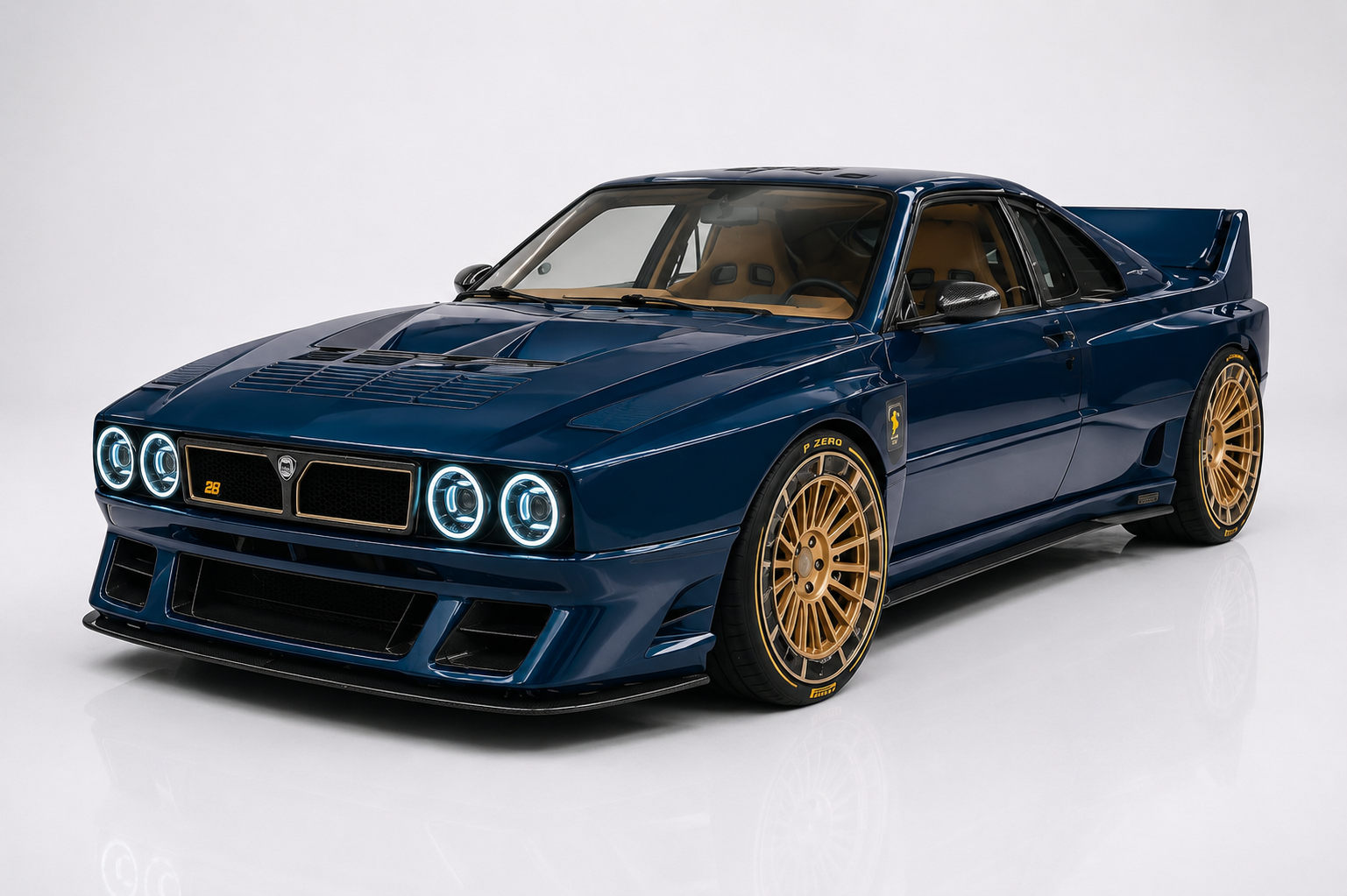 Deep-blue Kimera Evo38 in a studio setting, front three-quarter view showing quad LED-halo headlamps, aggressive front splitter and bumper venting, wide-body arches with gold multi-spoke wheels wearing Pirelli P Zero tyres, and Group B-era louvred bonnet — the 4WD 'what-if' evolution of the Evo37.