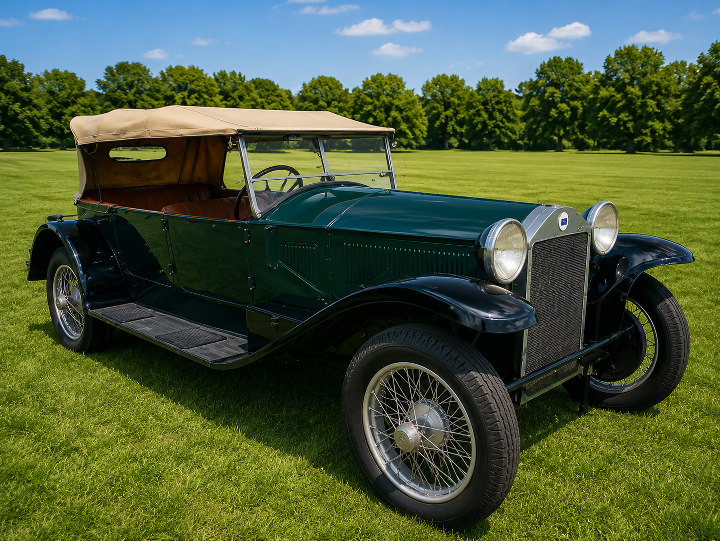 Dark green 1920s Lancia Lambda Torpedo tourer with a tan soft-top, parked on grass in a park setting.